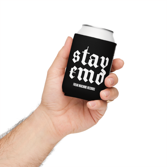 Hand holding a can in a black Stay Emo neoprene cooler with white Freak Machine Records lettering.