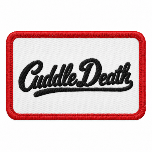 Cuddle Death embroidered patch with black cursive lettering, white twill and a red stitched border.